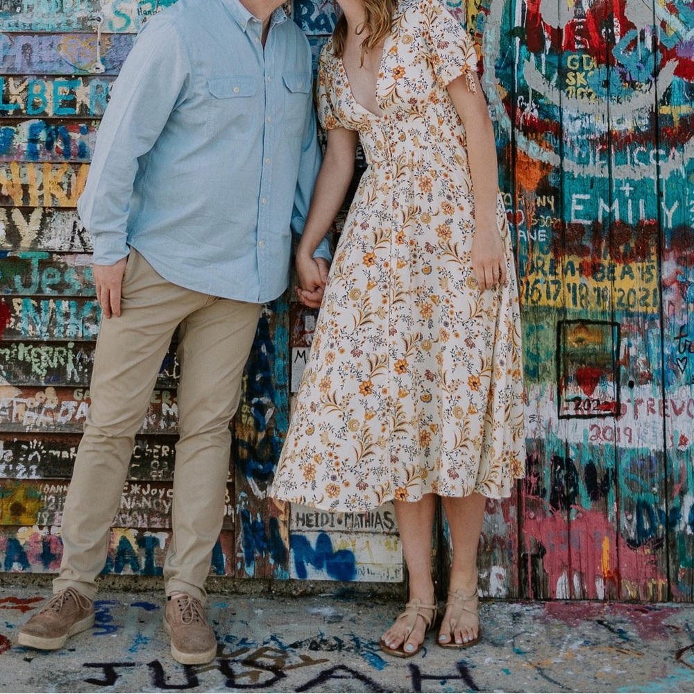 Light yellow, floral dress with plunge neckline and capsleeves